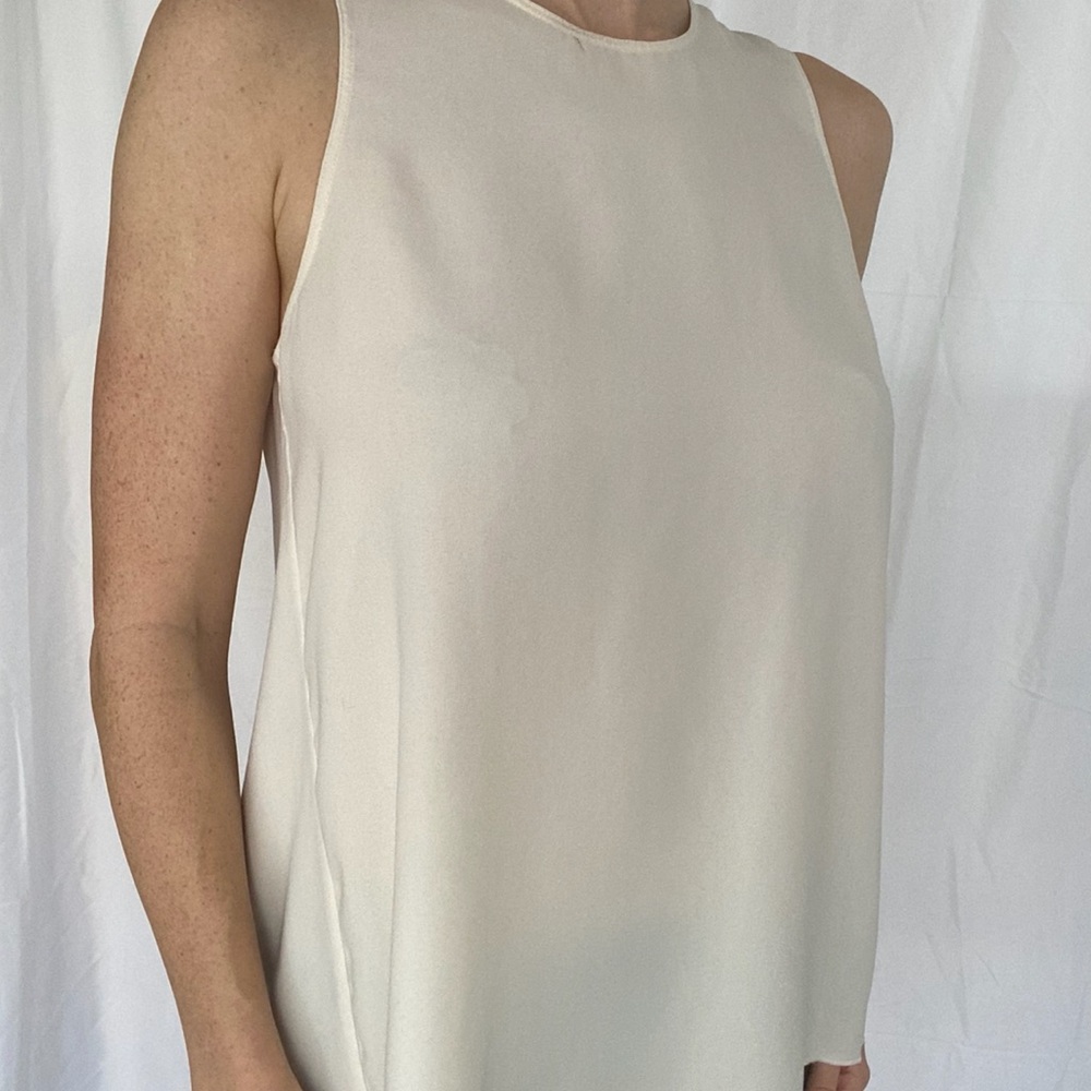 Cream open-back Aritzia blouse